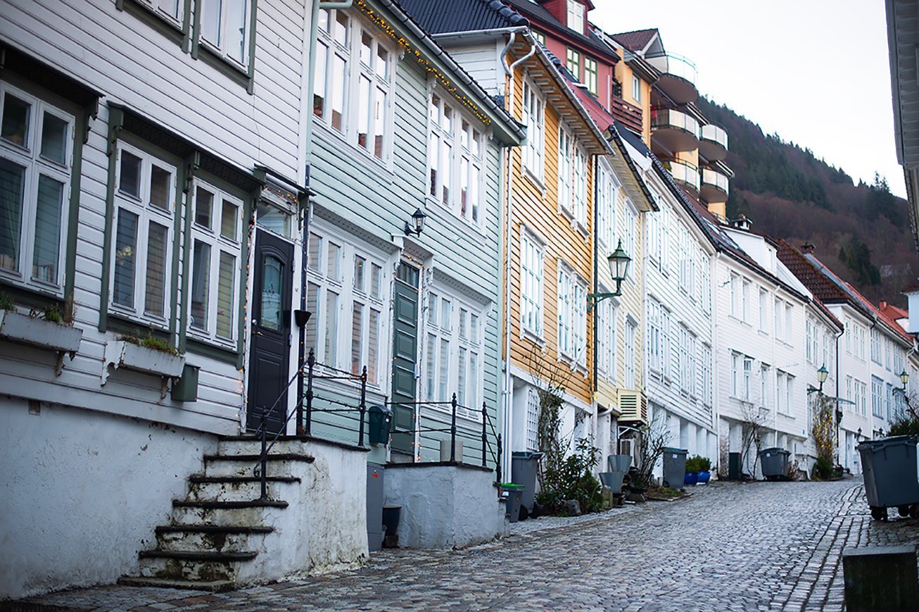 Cobbled street with white wooden houses